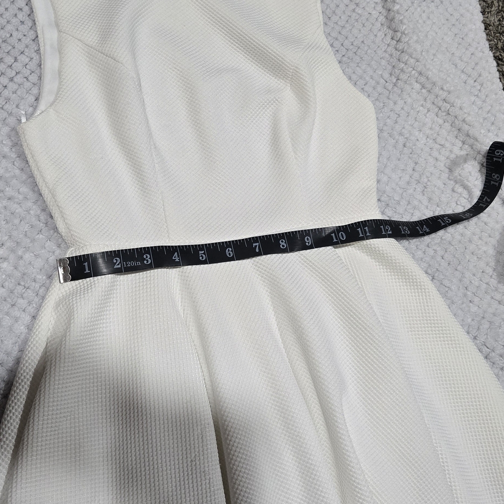 Elegant White Sleeveless Mini Dress - Picture 6 of 9